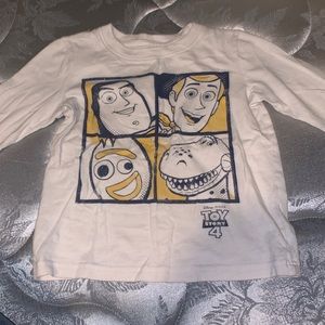 A white toy story shirt